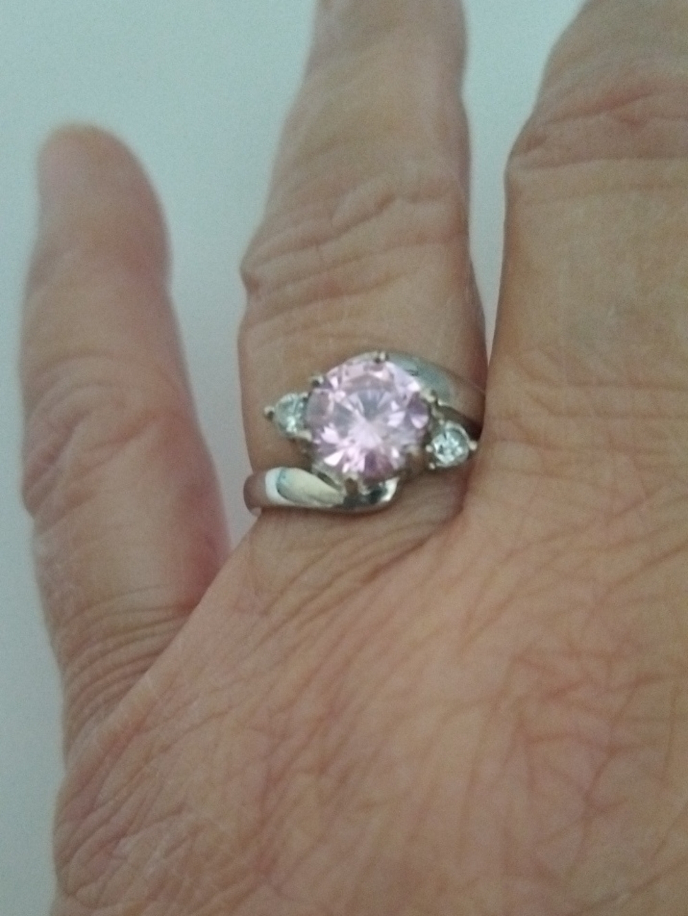Silver Ring with Pink Center Stone and Clear Side Accents